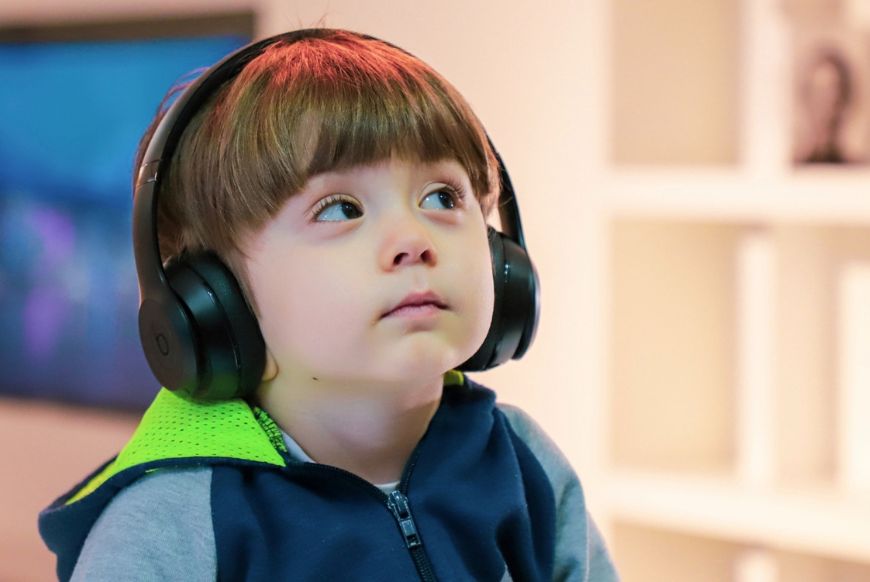 Boy with Headphones at We The Curious